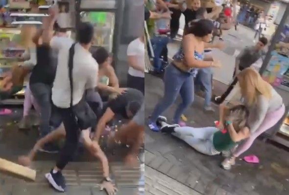 Wild Fight Of Vendors With Sticks And Chairs in Venezuela 
