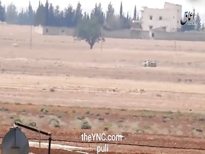Bestroying a BMW vehicicle Belongingto YPG near Umm Hosh Village in aleeppos nortrem country side