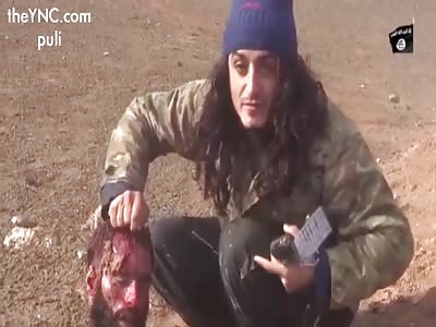 Soldiers proudly show their fallen opponents