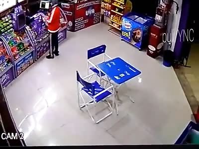 He left work, crossed to the kiosk to buy and was killed at point-blank range (fire weapon shot)