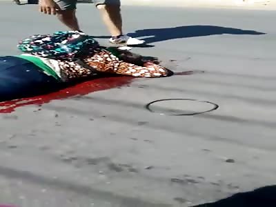 Woman with serious Injuries in Traffic Accident Waiting for Medical Help