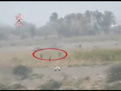 Yemeni army forces attacking a group of militias