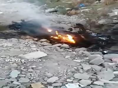 They find corpse in flames