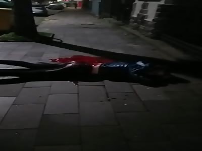 Transvestit in agony after receiving shot