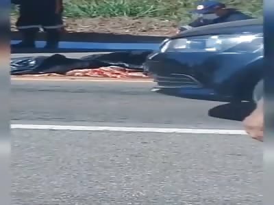 man smashed in the road