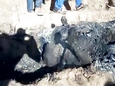 Man's corpse in burned state.