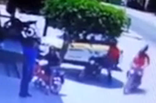 Hitman Shoots Roadside Occupant