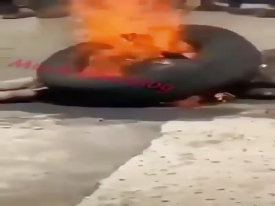 Thief stabbed and burned alive.