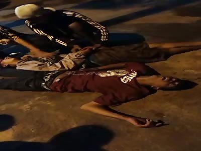 Two people are killed with multiple shots from a firearm