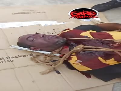 man after being questioned is hanged by rivals 