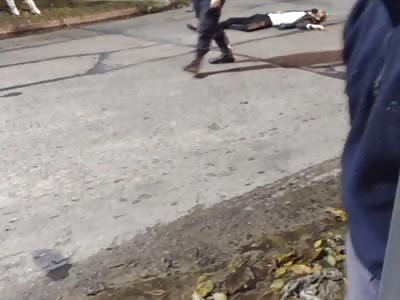 A policeman killed a biker and wounded another in an attempted execution.