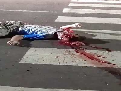 Shocking: victim with smashed head after being crushed by truck.