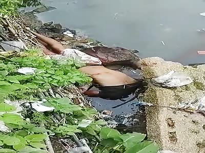 shocking man drowning in putrid water 