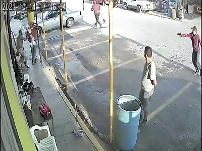 They capture the moment when a hitman shoots a merchant 