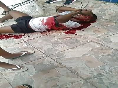 thief tied hand and foot is brutally punished 