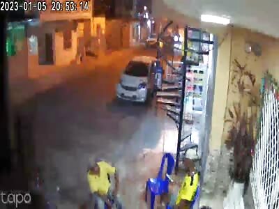 hitman murders his victim with several shots 