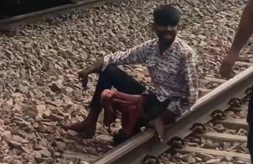 MAN LOSES LEG ON TRAIN TRACKS