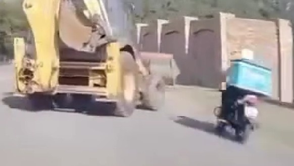 Delivery Driver Seriously Injured After Crashing Into Frontloader