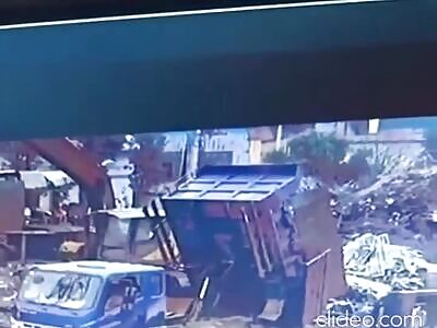 Worker Pressed By Dump Truck