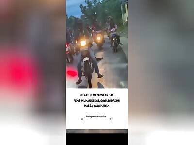 RAPIST AND MURDERER BEING DRAGGED BY MOTORCYCLE