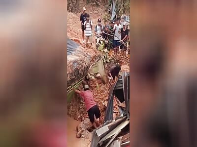 CORPSE IN RIGOR MORTIS REMOVED FROM THE MUD