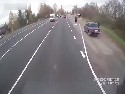 Lady goes airborne after bein struck by speeding car