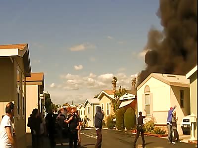 POLICE PULL MAN FROM BURNING TRAILER SECONDS BEFORE IT EXPLODES