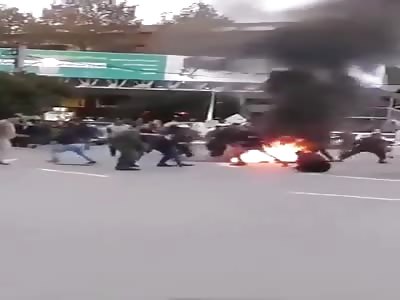 Iranian Riot Police Shooting Unarmed Protester Multiple Times 