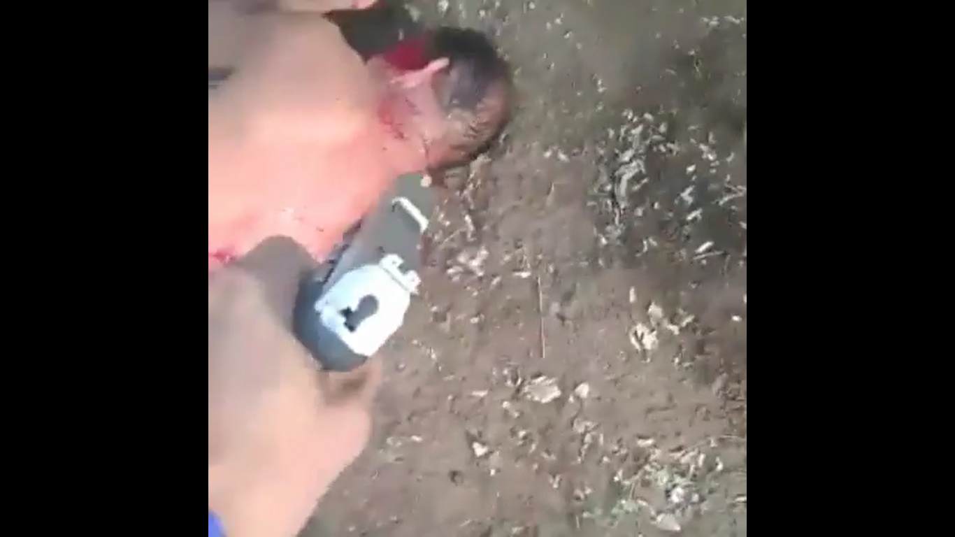 Assassin Sneaks Up On His Target And Unloads His Pistol Into Him