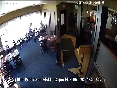 Car Smashes Through Restaurant Window 