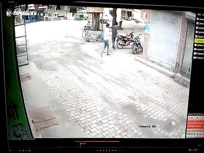 Man escapes dramatically after being trampled by fighting bulls