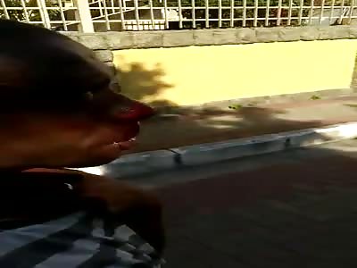 Bleeding thief paraded in the street