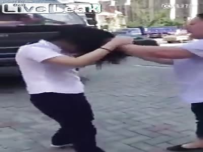 Big wife beats small mistress