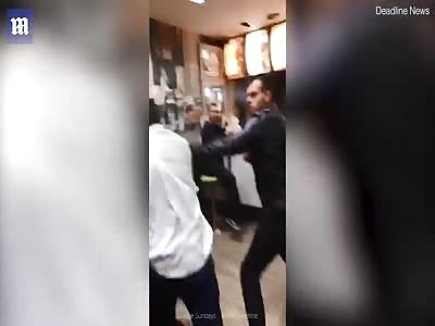 Black boy  will beating  white man and ends up banging his head on the windowpane having a large cut