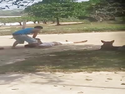 Man being killed with giant stone