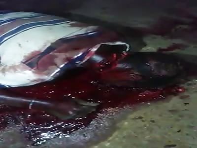 Dead with a knife-cut neck