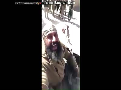 Abu azrel showing daesh bodies