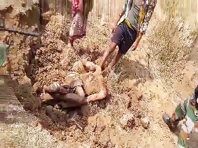 Assassins forced by police to show where this buried body