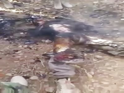 Body of soldier daesh being roasted