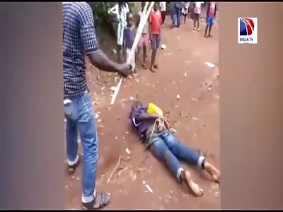 Thief punished with wood pieces