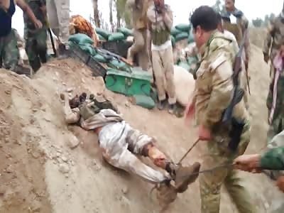 broken daesh soldiers dragged 