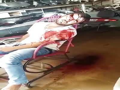 Man takes last breaths shot in a chair