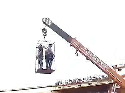two men running on a bonfire in india