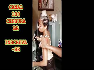 Young woman forced to cut her own hair after apologizing to rival faction