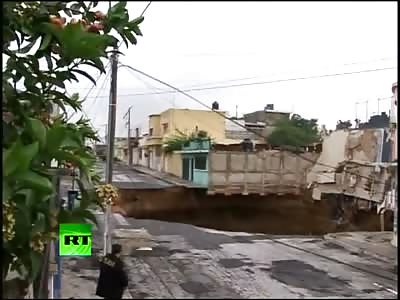 GUATEMALA 300 ft DEEP SINK HOLE KILLED 15 SWALLOWED BUILDING