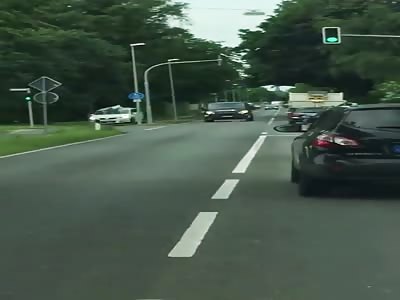 Man jumped onto the bonnet of a driving car.