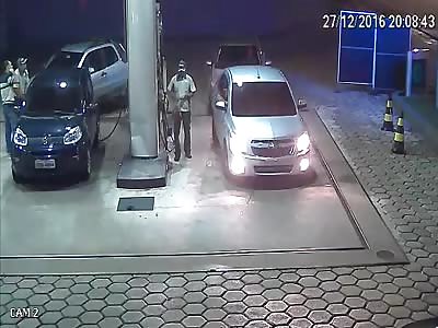 gangsters pay for fuel  then robs it back again 