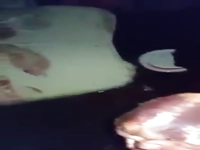 Gangsters heart still beating..KILLER HOLDS A MAN'S BEATING HEART IN HIS HANDS