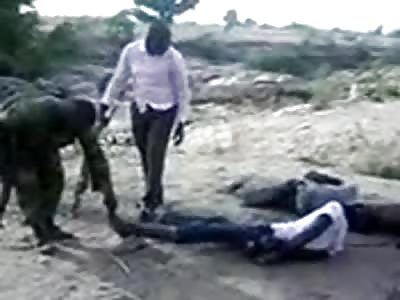 soldiers break the legs of 2 men