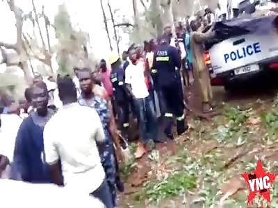 carrying the dead youths at a Waterfall Accident   